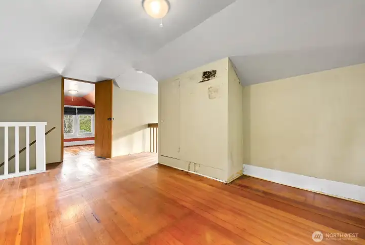 upper level bonus room with bright windows