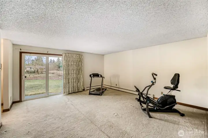 Primary bedroom is oversized and has access to backyard and patio