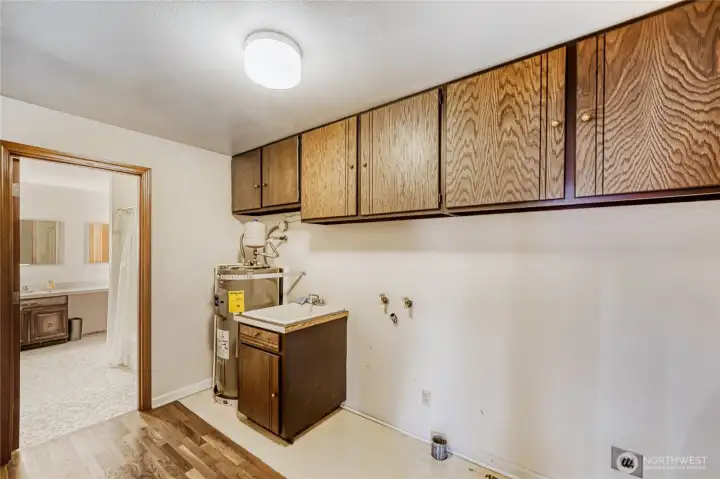 Oversized laundry room off kitchen