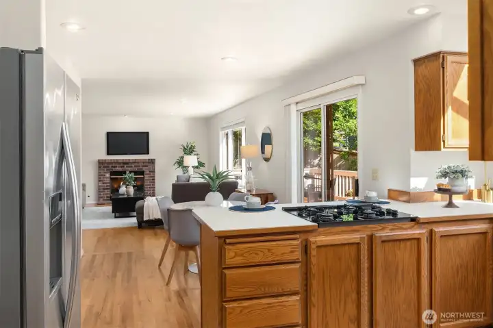 Kitchen to Family Room with Gas Fireplace