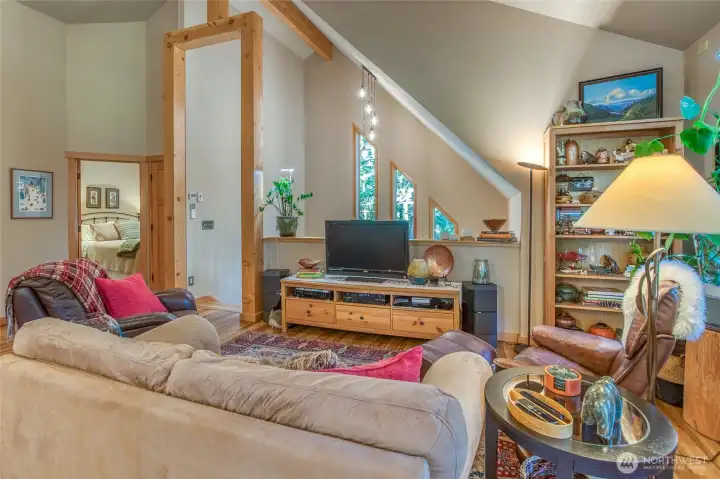 Living area, top of stairway and bedroom shown here.