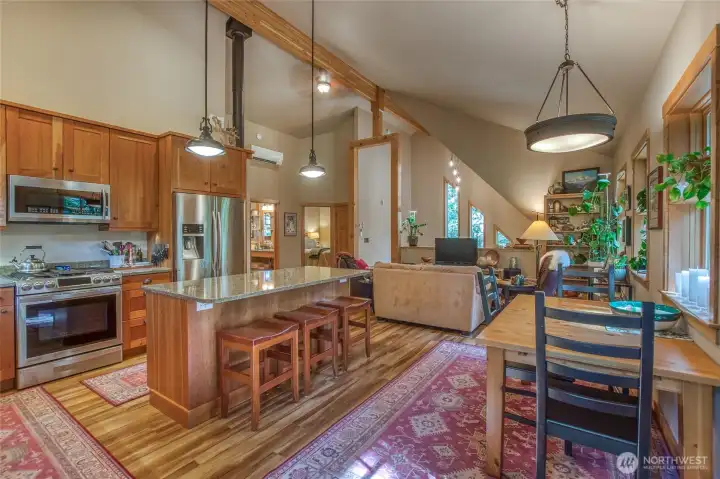 From the kitchen looking into the living area. Easy comfort, room to entertain or enjoy quiet time.