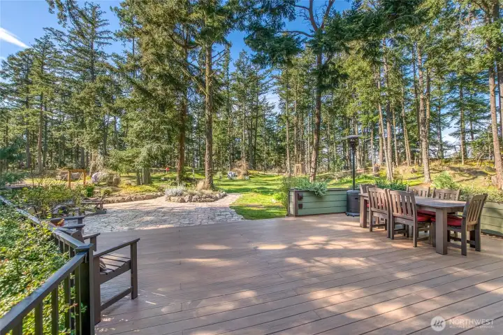 Deck connects to molded concrete paver patio.