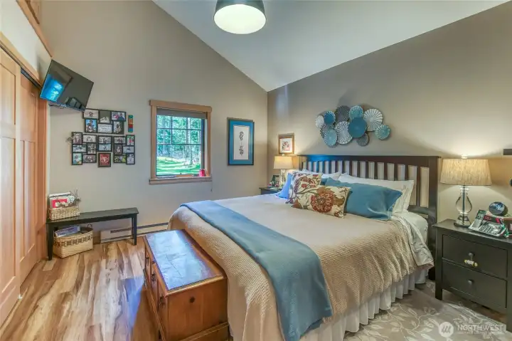 One of two bedrooms, vaulted ceilings and built-ins in the large closet, plenty of storage.