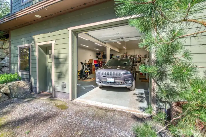 Main level, garage and storage. Finished and could be converted to living space.
