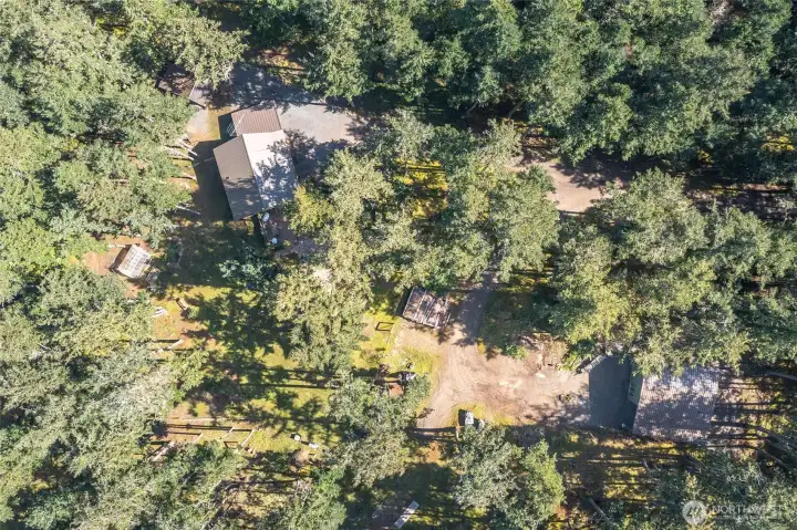 Residence on the top left, shop building lower right.