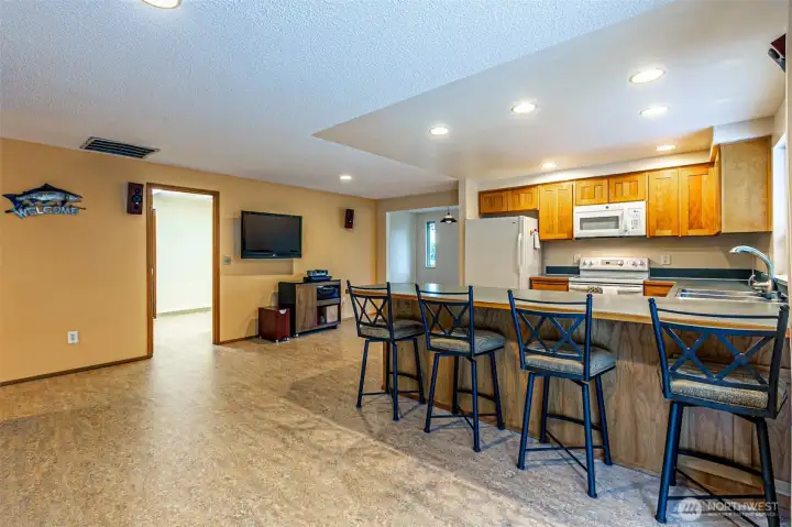 This photo, showing the kitchen is taken from the dining room's patio door.