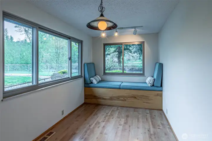 The bonus room with its window seat looking out at the river.