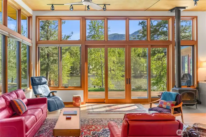 Welcome to this beautiful riverfront home, near the vibrant town of Twisp!