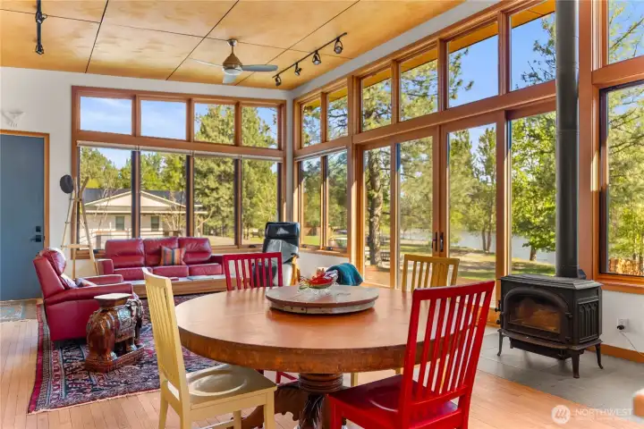 Wood stove for those chilly winter nights, in the heart of the open living space.