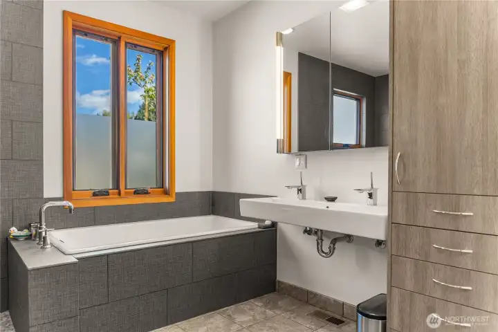 Primary bathroom with beautiful soaking tub.