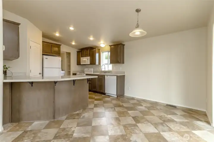 Living Room to Dining and Kitchen