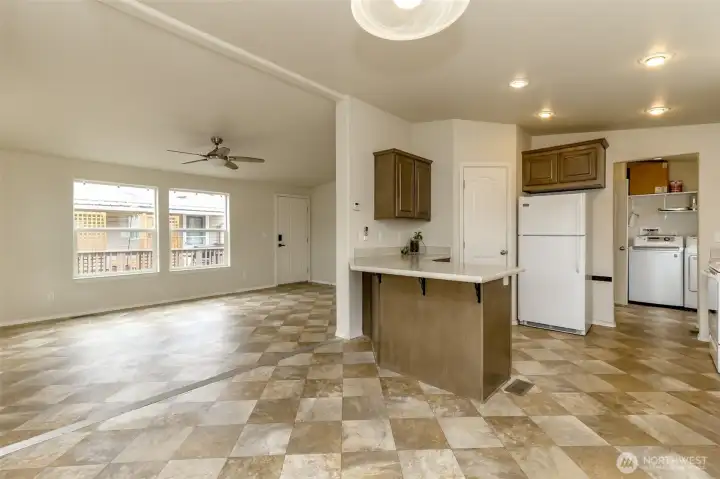 Living room and kitchen with eating bar