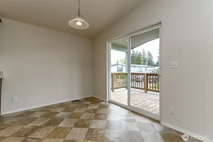 Dining room with slider to full deck