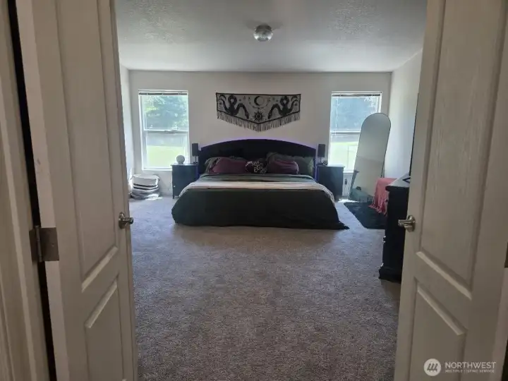 Large Primary with double walk-in closets