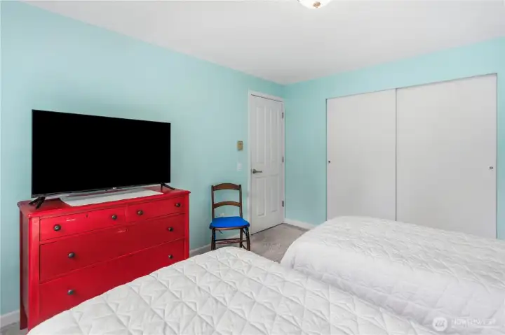 Second bedroom has a large closet and houses the water heater.