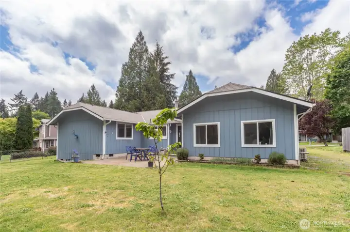 Back of the house. There is fencing on the sides. It would not be hard to add fencing to enclose for a pet.