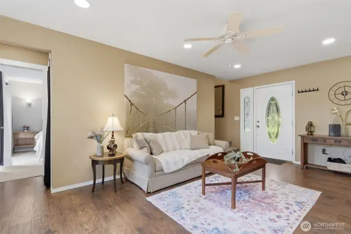 Door to the left leads to the primary suite.