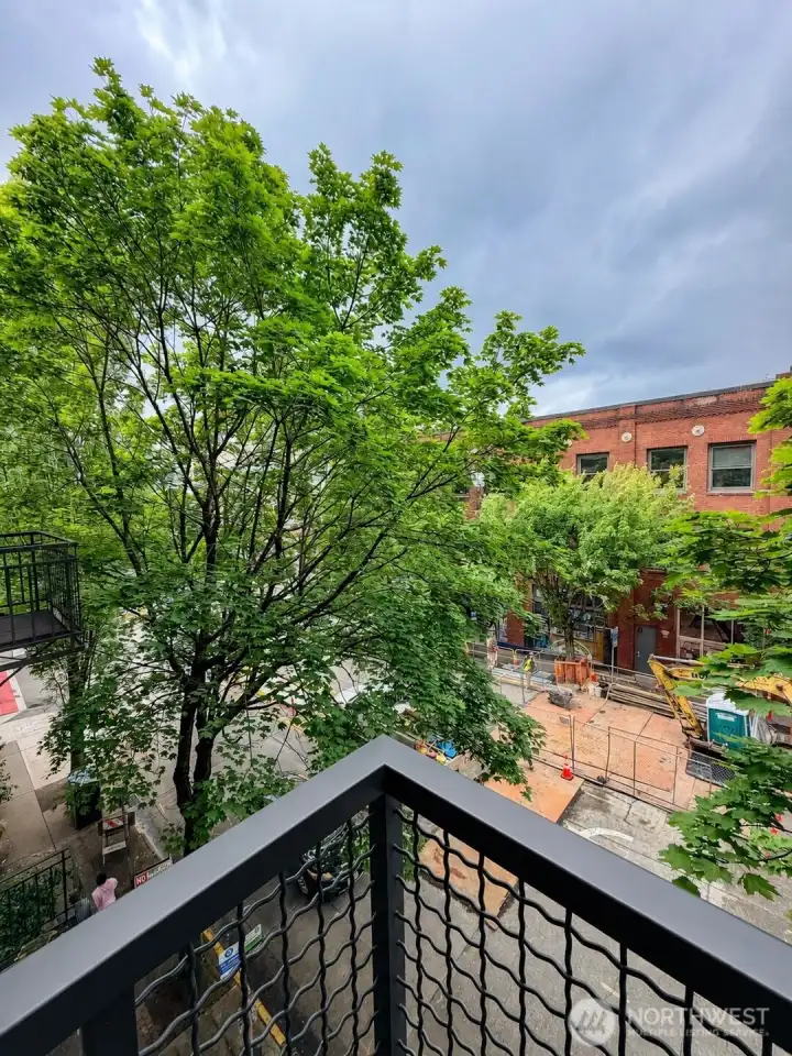 Step onto your private balcony and take in the treetop canopy framing the Capitol Hill streetscape below. A front-row seat to one of Seattle's most vibrant neighborhoods.