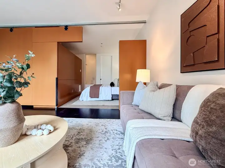 The puzzle wall is more than a style moment; it's smart use of space in a well-designed floor plan.