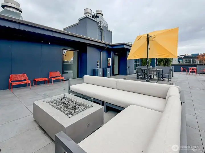 From up here, Capitol Hill unfolds in every direction. The rooftop deck is a Seattle summer waiting to happen