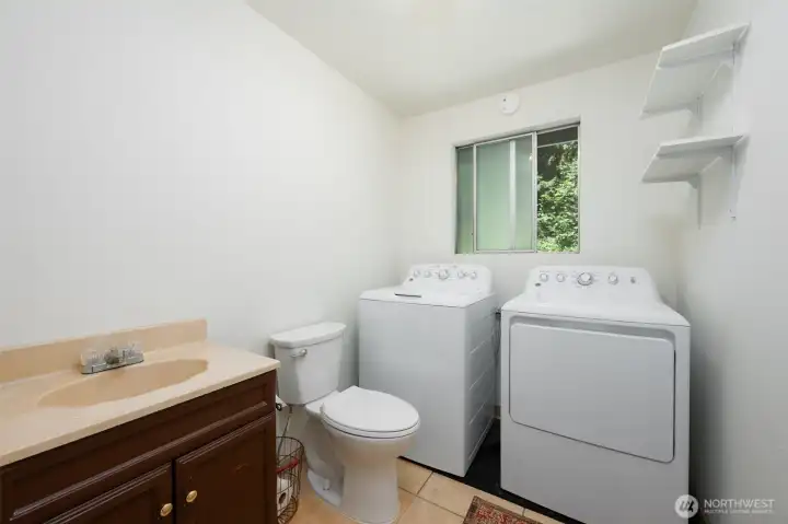 Your half bath houses your laundry which is convenient to all locations in the house. Your half bath houses your laundry which is convenient to all locations in the house.