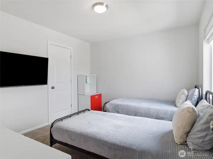 Walk-in closet in first bedroom. Walk-in closet in first bedroom.
