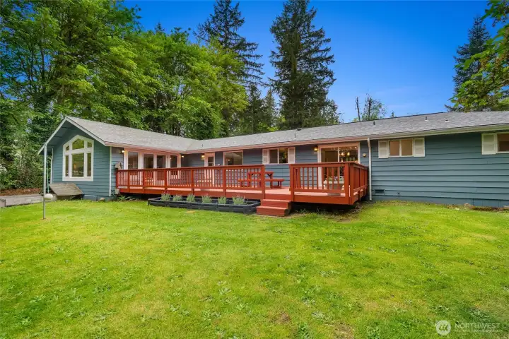 Fully remodeled rambler on 2.3 private acres w/ separate lower level living space and second kitchen!