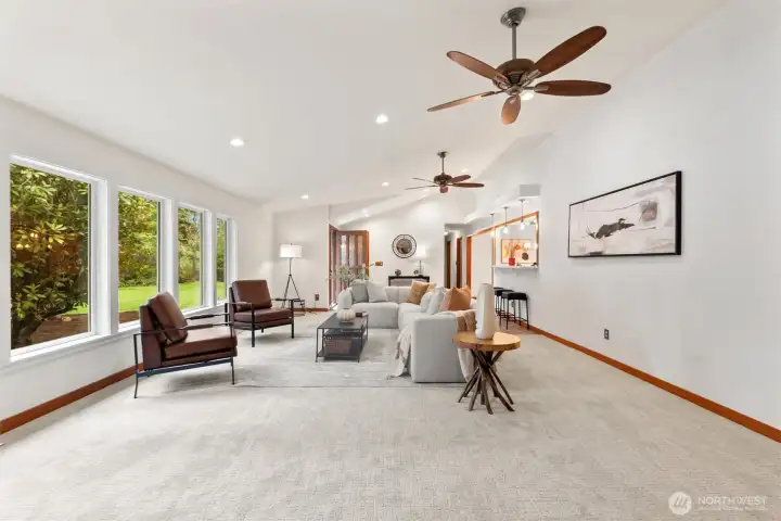Spacious, light-filled living room, with expansive wall of windows!