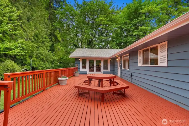 Newly painted, expansive deck, offering the perfect setting for outdoor entertaining.