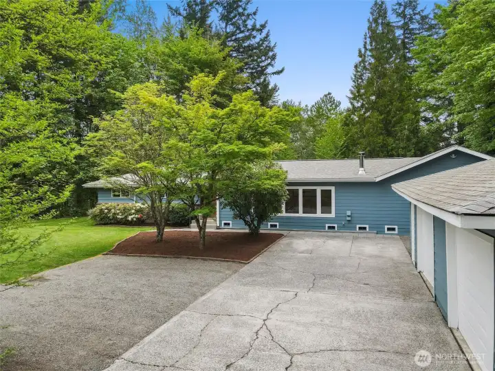 Spacious 2-car detached garage with ample storage and workspace.