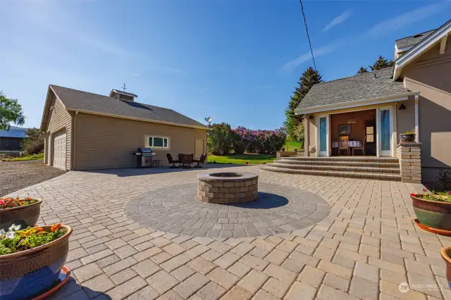 1600 sq ft paver patio with firepit.