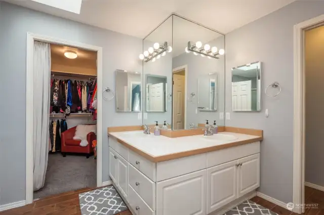 Primary bath has dual sinks, walk-in closet, separate toilet room