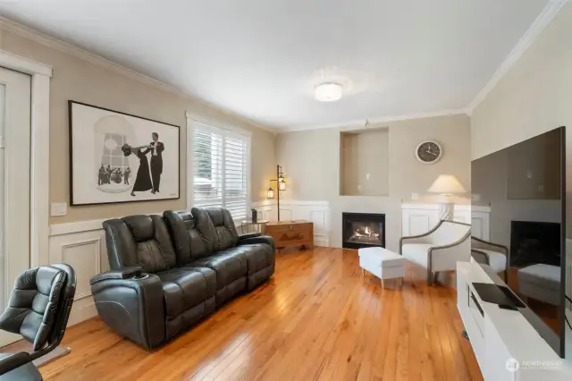 The gorgeous hardwood floors teamed up with millwork accents and crown molding make this home extra special.