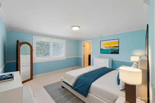 Guest bedroom on second floor is spacious and offers a large walk-in closet.