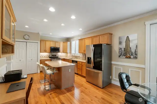 The kitchen is open and very functional. Offering quartz counters, stainless appliances and gas stove. Large pantry closet for all your goodies. A built in desk to handle all of your daily activities.