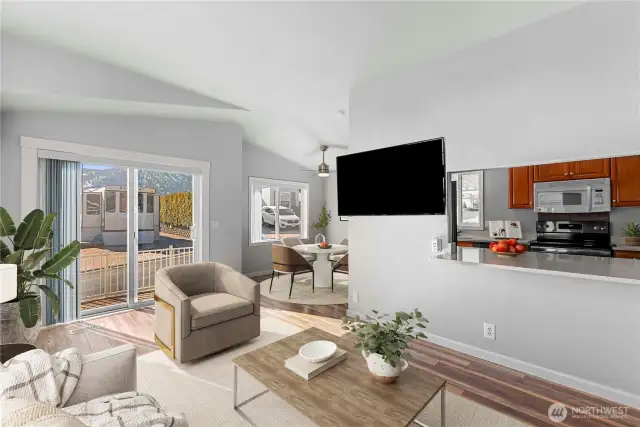 That passthrough from kitchen to living room joins the spaces and adds additional dining space.