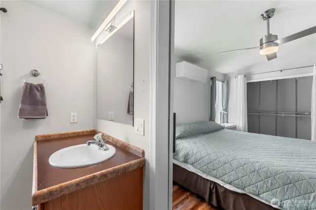 Note the full-length closet on the wall opposite the primary bath.