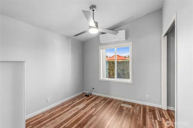 The guest bedroom with lighted fan & mini split