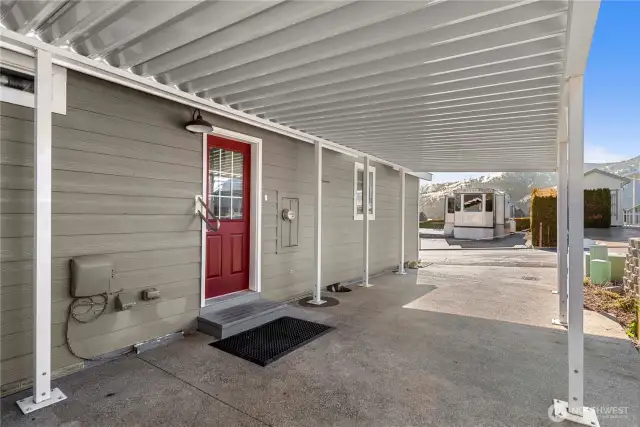 This carport fits 2 cars parked tandem