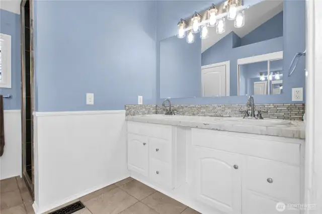 Primary Bathroom with Vaulted Ceilings and separate commode room