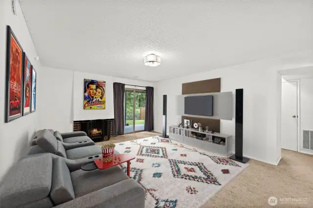 Versatile lower-level living space featuring a second fireplace—perfect for an entertainment room, home theater, or an additional living area.