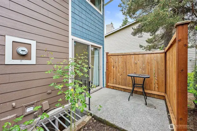 Partially fenced, cozy patio area—perfect for enjoying your morning coffee in privacy