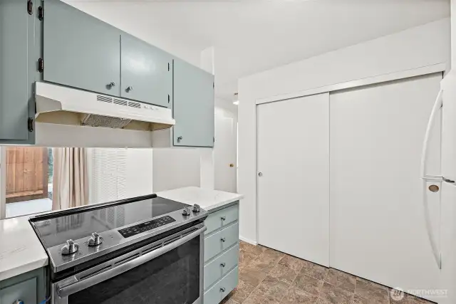 Updated granite countertops with a new kitchen sink, plus a spacious pantry to store all your cooking essentials