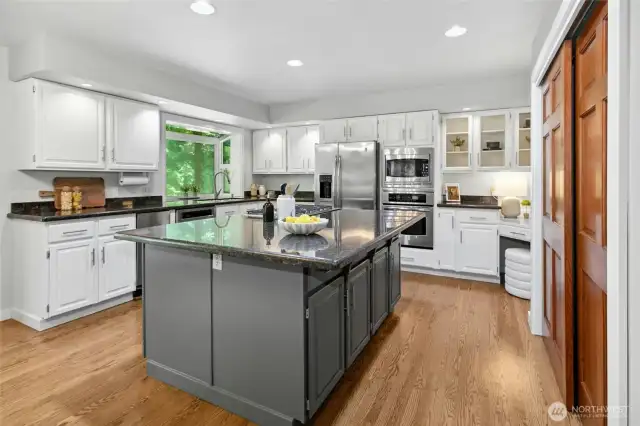 Updated kitchen with pantry and desk area.