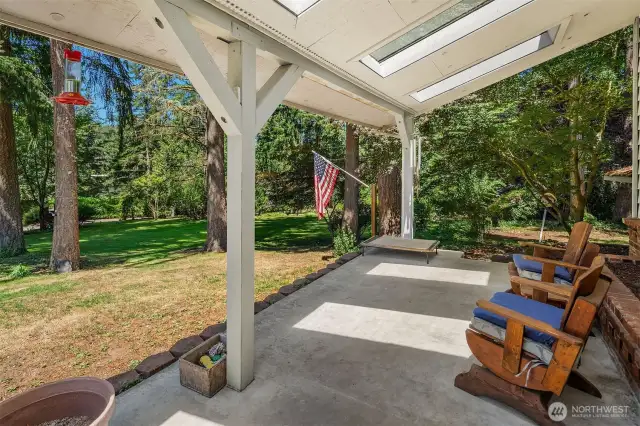 Relax on the porch and watch friends and family play in the spacious yard.