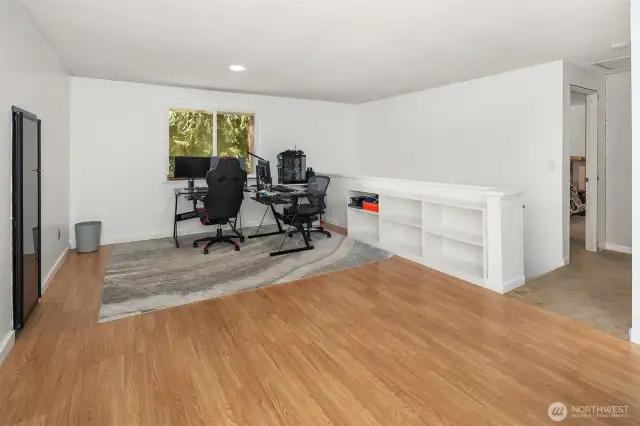 The upstairs has a gigantic loft. Big enough to create another living space, office of flex room.