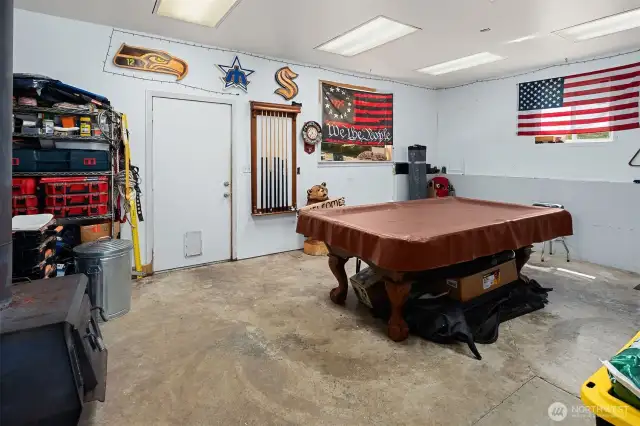 But wait... there is more with the pool table/man cave in the backroom near the garage.