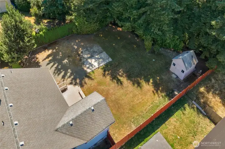 Overview of backyard prior to being serviced and green again... Roof recently serviced and inspected...