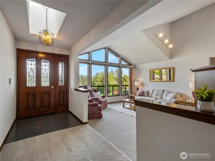 Skylights and floor to ceiling windows make this home bright and welcoming.